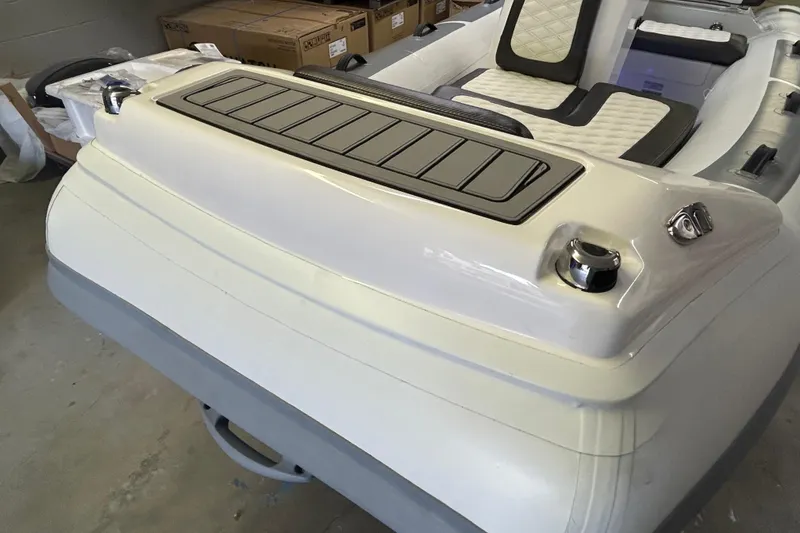 Slide: The Image of 2025 Highfield Sport 390 boat interior with sleek seating and modern design. - 16