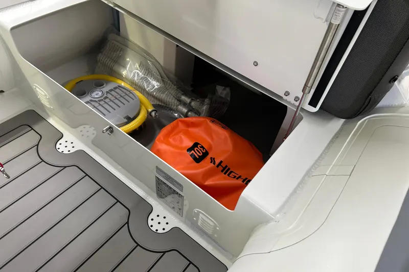 Slide: The Image of Storage compartment of 2025 Highfield Sport 390 boat with equipment and accessories. - 6