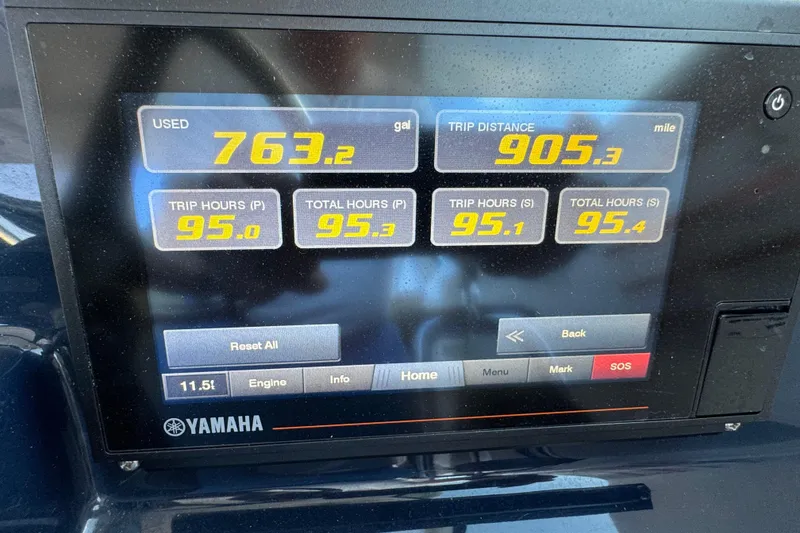 Slide: The Image of Yamaha display showing fuel usage and trip data for 2021 Pursuit DC 326 Dual Console. - 11