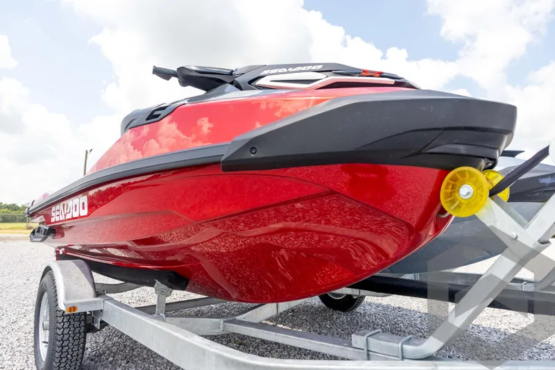 Slide: The Image of 2024 Sea-Doo RXP-X 325 jet ski handlebars and dashboard, featuring vibrant green accents. - 10