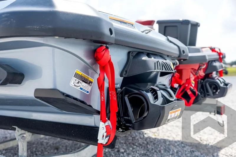 Slide: The Image of 2024 Sea-Doo RXP-X 325 jet ski rear view with red safety straps. - 16