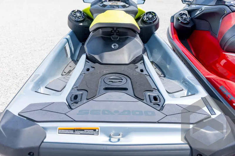 Slide: The Image of 2024 Sea-Doo RXP-X 325 jet ski, rear view, showcasing sleek design and seating. - 17