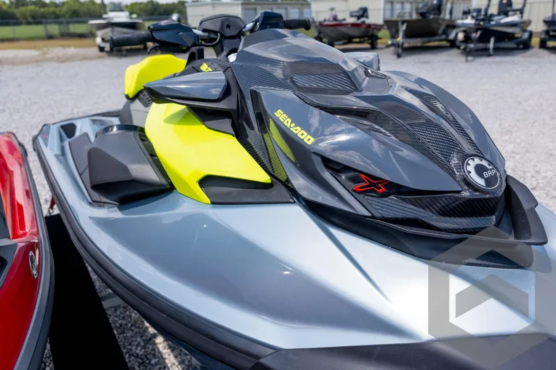 Slide: The Image of 2024 Sea-Doo RXP-X 325 jet ski, sleek design, vibrant yellow and gray colors. - 20