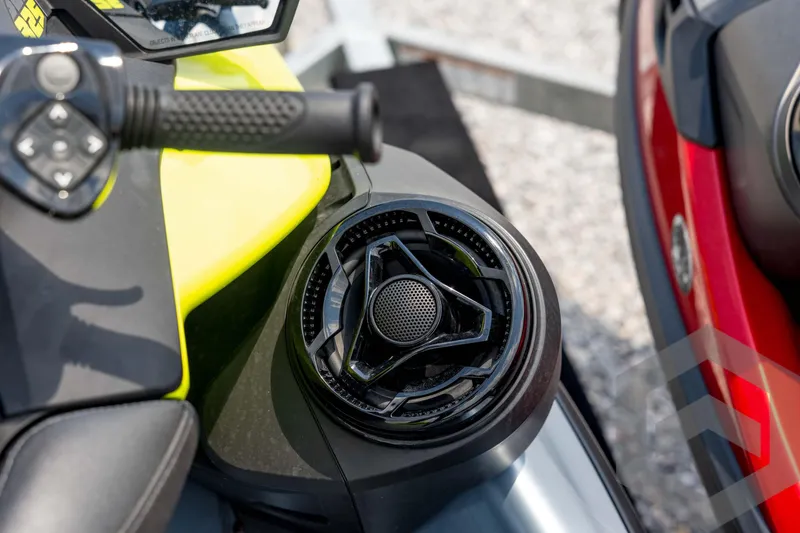 Slide: The Image of 2024 Sea-Doo RXP-X 325 handlebar and speaker detail, showcasing modern design features. - 28