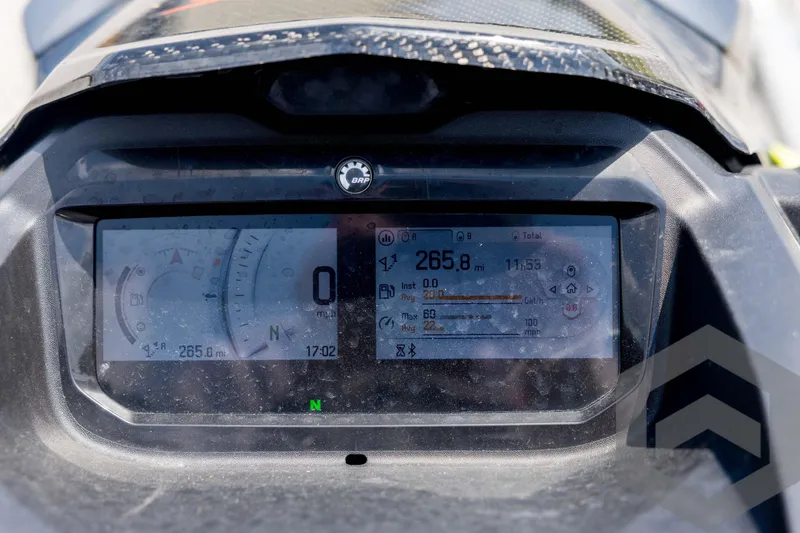 Slide: The Image of 2024 Sea-Doo RXP-X 325 dashboard display showing speed and navigation details. - 32