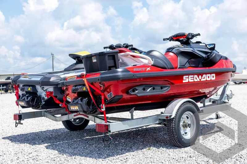 Slide: The Image of 2024 Sea-Doo RXP-X 325 jet ski on trailer, featuring sleek design and vibrant colors. - 5