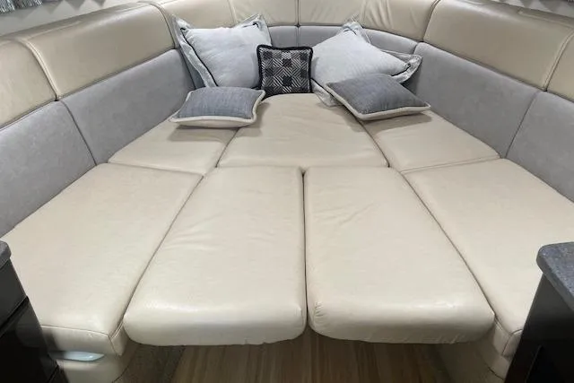 Slide: The Image of Luxurious interior seating of 2014 Formula 370 Super Sport boat with plush cushions. - 27
