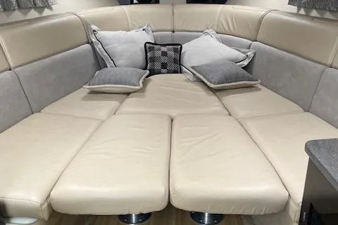 Slide: The Image of 2014 Formula 370 Super Sport interior with beige leather seating and decorative pillows. - 28