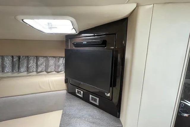 Slide: The Image of Interior of 2014 Formula 370 Super Sport with TV and modern furnishings. - 29