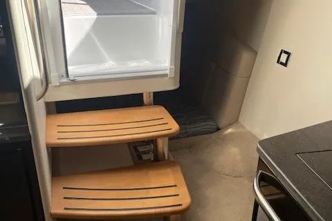 Slide: The Image of Interior of 2014 Formula 370 Super Sport with wooden steps and modern design. - 33