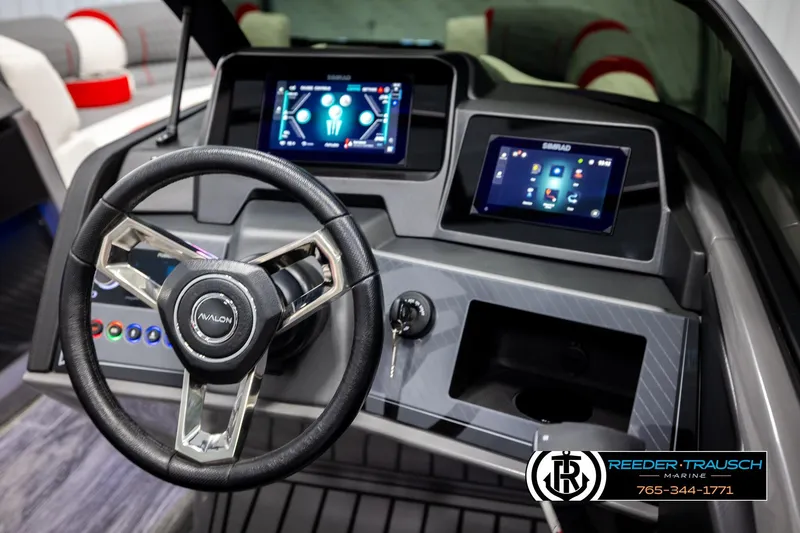 Slide: The Image of 2026 Avalon CAT CRBW boat dashboard with modern steering wheel and digital displays. - 32