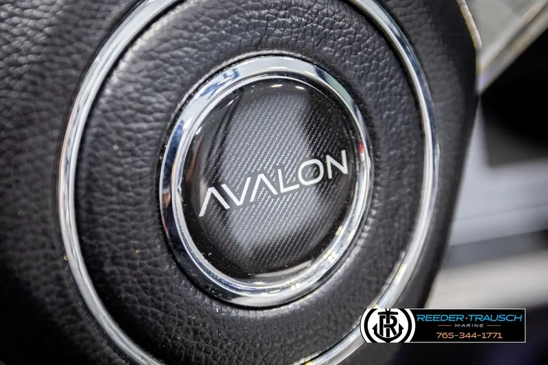 Slide: The Image of Close-up of Avalon CAT CRBW 2026 steering wheel emblem. - 34
