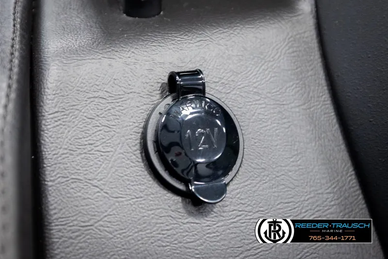 Slide: The Image of 12V power outlet in 2026 Avalon CAT CRBW boat interior, Reeder-Trausch Marine logo. - 36