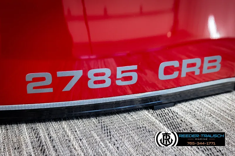Slide: The Image of Red Avalon CAT CRBW 2026 boat with "2785 CRB" marking, Reeder-Trausch Marine logo. - 60
