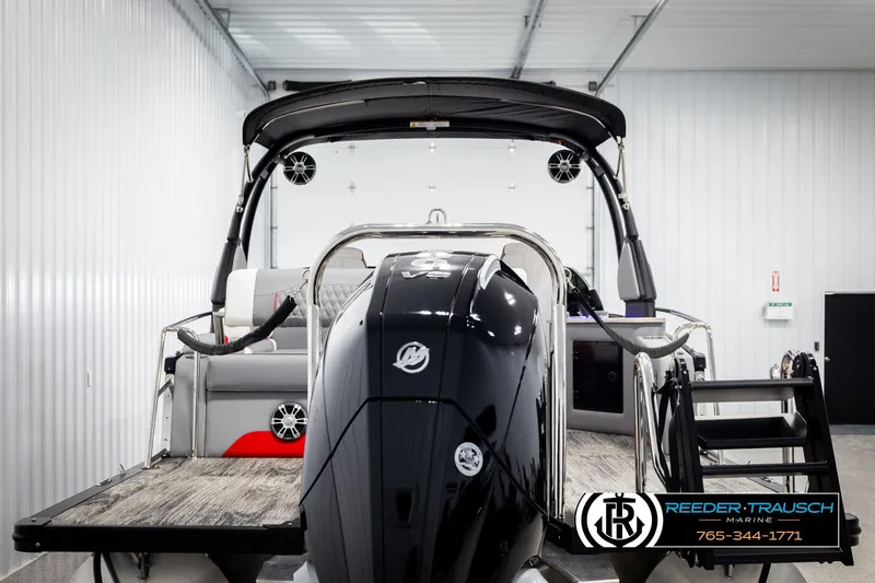 Slide: The Image of 2026 Avalon CAT CRBW boat in showroom, featuring sleek design and modern amenities. - 7