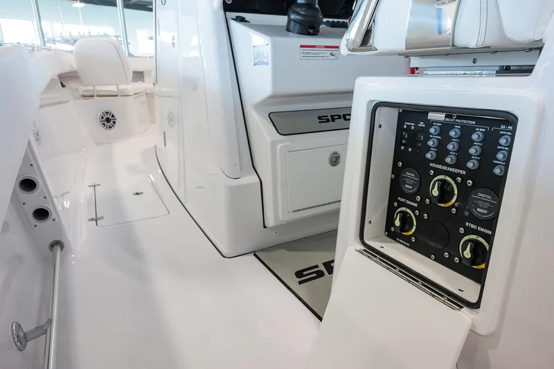 Slide: The Image of 2026 Sportsman Open 322 Center Console boat interior with control panel. - 25