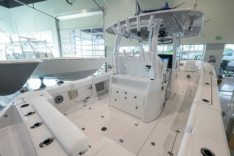 Slide: The Image of 2026 Sportsman Open 322 Center Console boat interior, featuring spacious seating and modern design. - 28