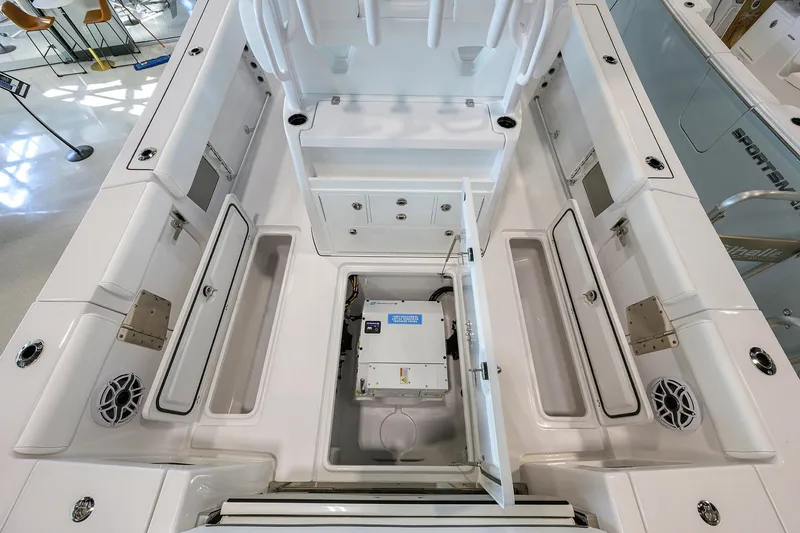 Slide: The Image of 2026 Sportsman Open 322 Center Console boat interior with open storage compartments. - 30