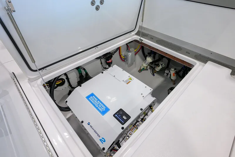 Slide: The Image of 2026 Sportsman Open 322 Center Console boat with Seakeeper 2 stabilizer unit. - 32