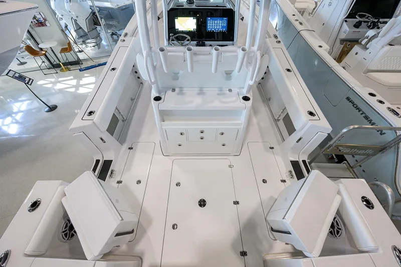 Slide: The Image of 2026 Sportsman Open 322 Center Console boat interior with modern helm and seating. - 33