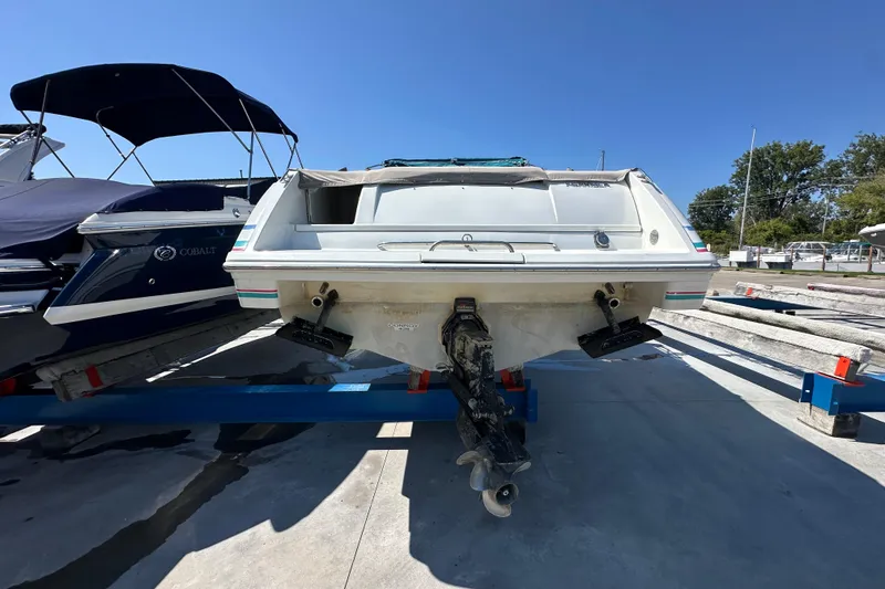 Slide: The Image of 1995 Formula 280 Sun Sport boat on trailer, rear view, sunny day. - 2