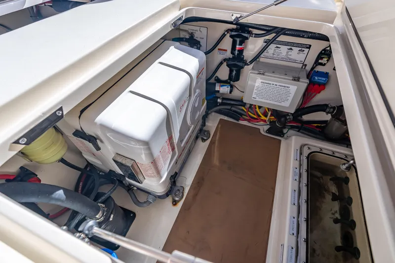 Slide: The Image of 2021 Scout 380 LXF boat engine compartment with wiring and equipment. - 72