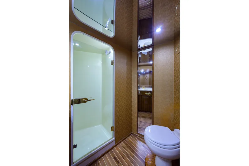 Slide: The Image of Luxurious bathroom in 2005 Viking 61 yacht with shower and toilet. - 14