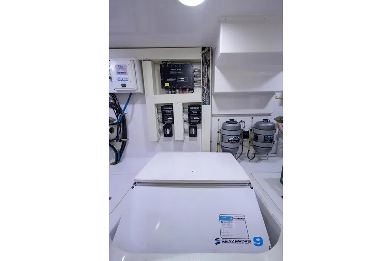 Slide: The Image of Engine room of 2005 Viking 61 yacht with Seakeeper 9 stabilization system. - 71