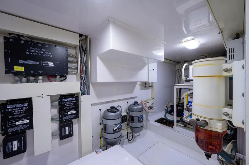 Slide: The Image of Engine room of 2005 Viking 61 yacht with electronic gear interface modules. - 73
