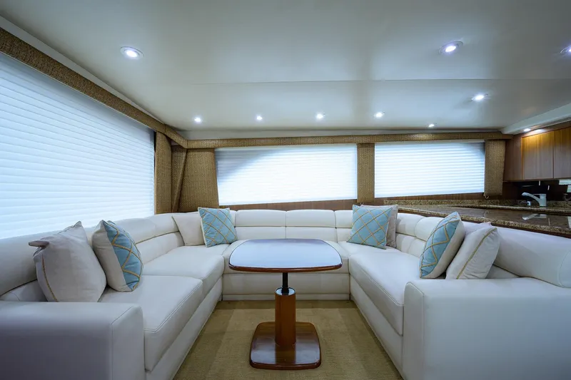 Slide: The Image of Luxurious interior of 2005 Viking 61 yacht with plush seating and elegant decor. - 95