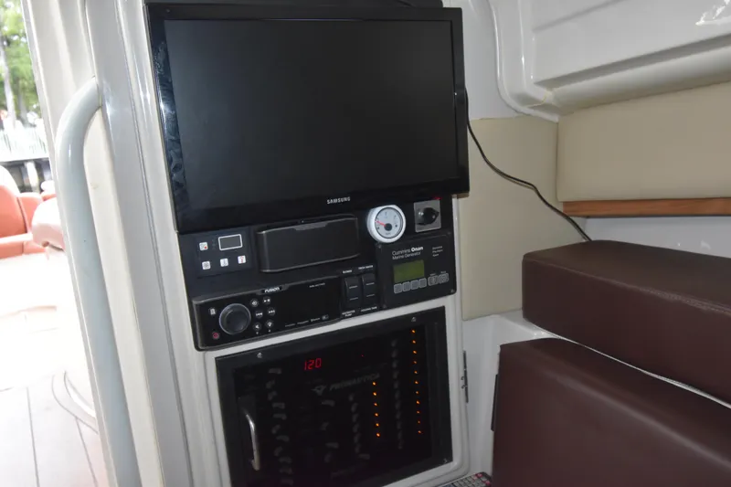 Slide: The Image of Control panel and monitor inside 2018 Pronautica 34 boat cabin. - 17