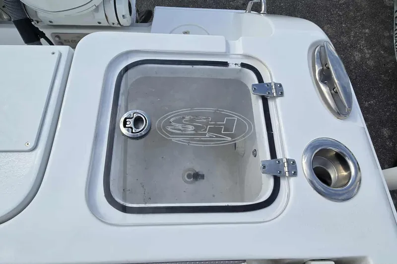 Slide: The Image of 2024 Sea Hunt Gamefish 27 Coffin Box with transparent lid and stainless steel fittings. - 28