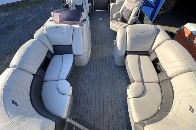 Slide: The Image of 2021 Starcraft SLS 1 boat interior with spacious seating and modern design. - 6