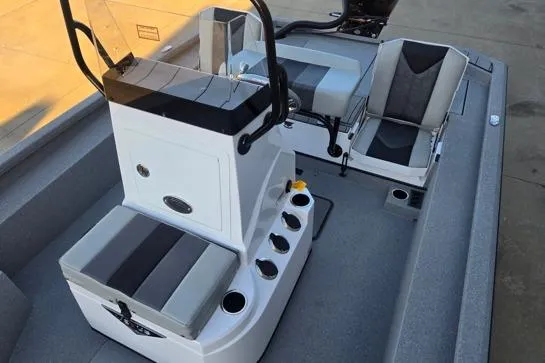 Slide: The Image of 2026 Vexus ACX2150 boat interior with seating and control console. - 6