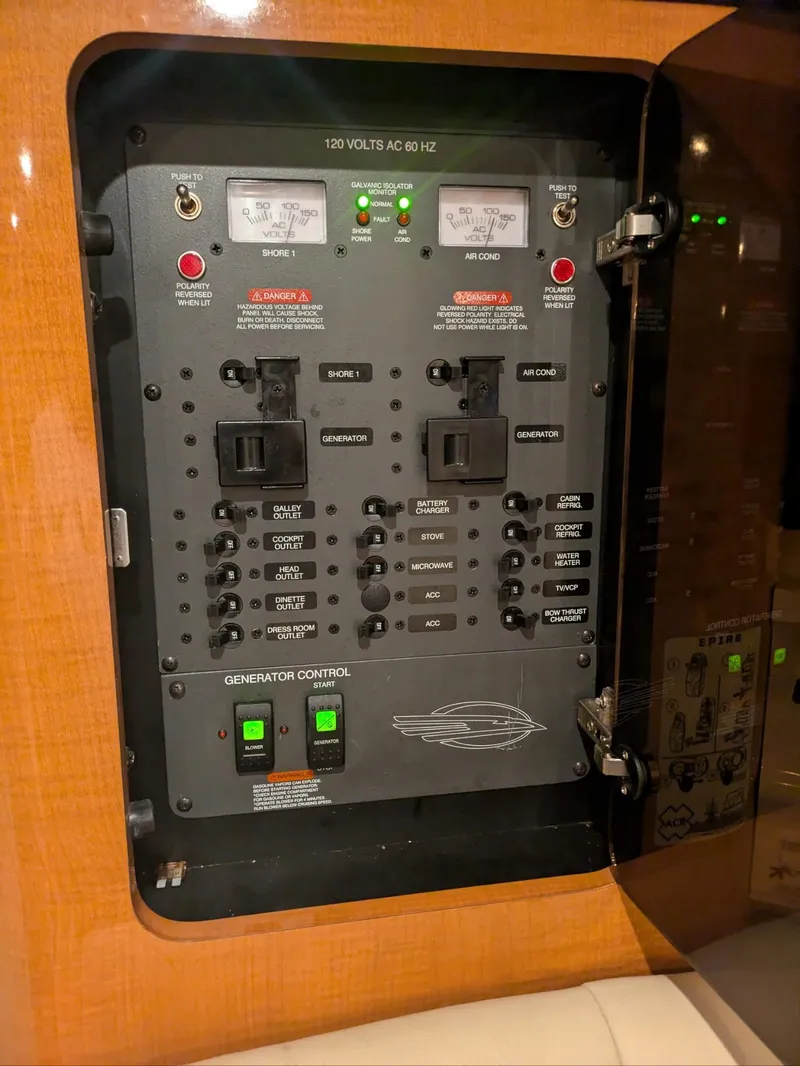 Slide: The Image of Electrical control panel of a 2008 Chaparral 330 Signature boat. - 12