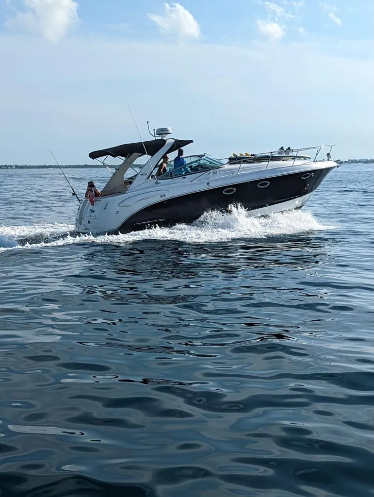 Slide: The Image of 2008 Chaparral 330 Signature cruising on open water. - 27