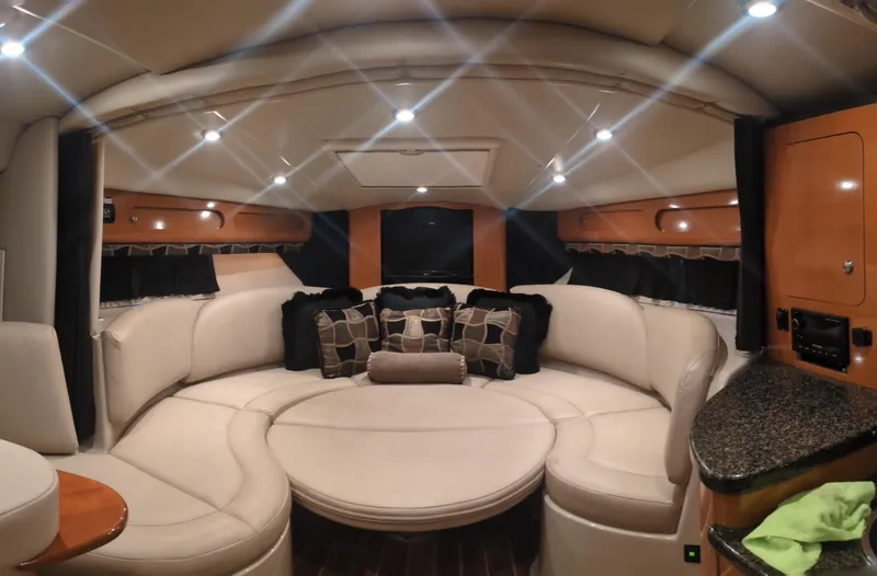 Slide: The Image of Luxurious interior of 2008 Chaparral 330 Signature yacht with plush seating and modern lighting. - 4