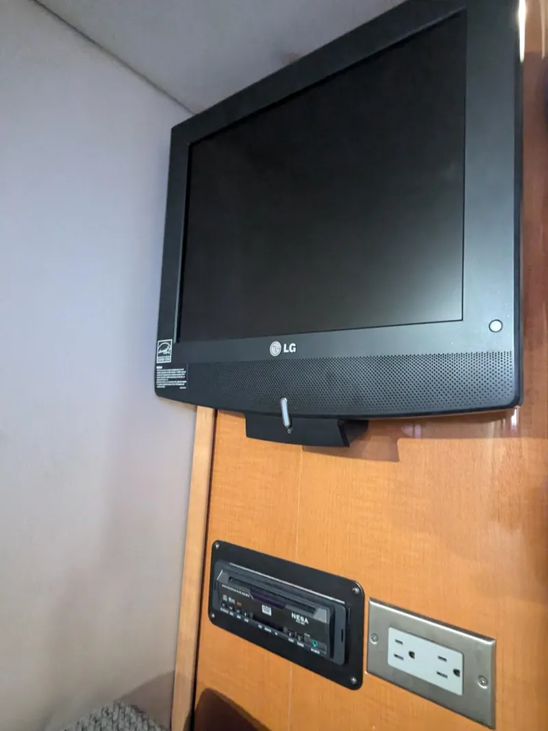 Slide: The Image of LG TV and entertainment system in 2008 Chaparral 330 Signature boat cabin. - 9