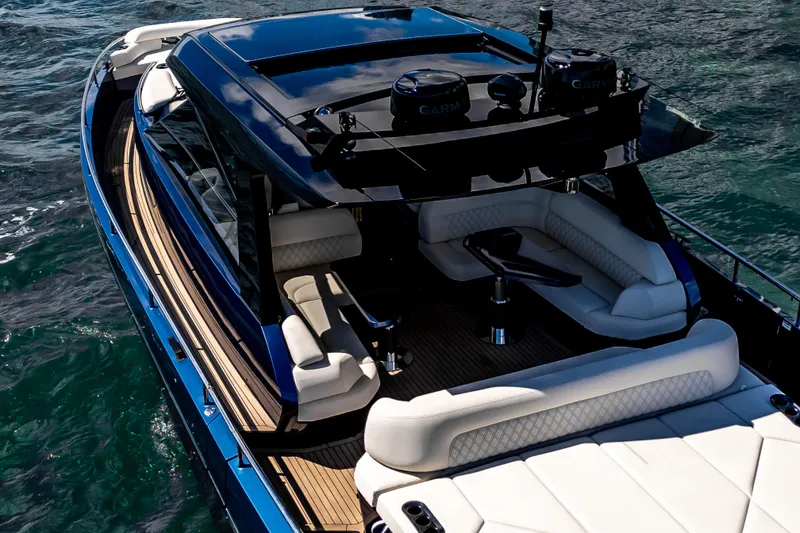 Slide: The Image of Luxurious 2025 Dutch American DA 53 yacht with sleek design and elegant seating on the water. - 1