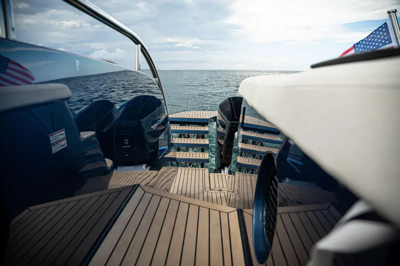 Slide: The Image of Sleek 2025 Dutch American DA 53 yacht with wooden deck and ocean view. - 19