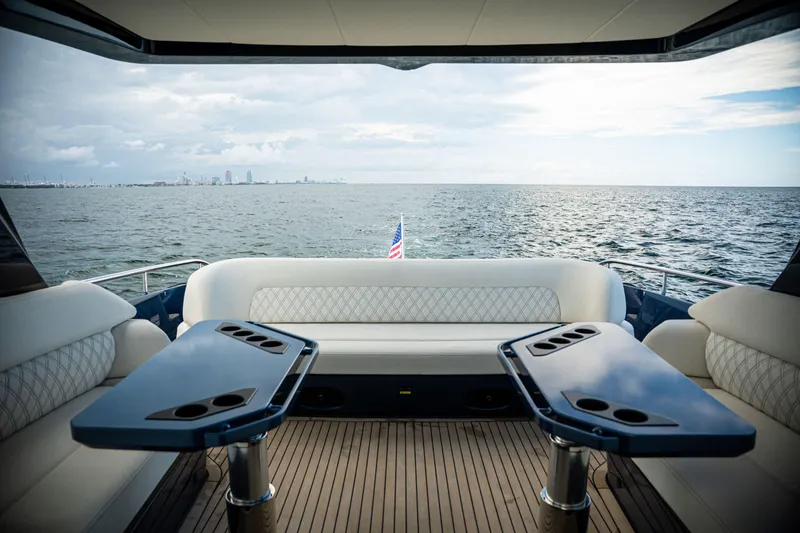 Slide: The Image of Luxurious seating area on 2025 Dutch American DA 53 yacht with ocean view. - 23