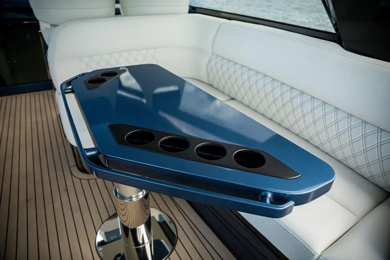 Slide: The Image of Luxurious interior of 2025 Dutch American DA 53 yacht with sleek blue table and white seating. - 28