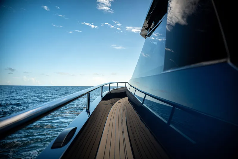 Slide: The Image of Sleek Dutch American DA 53 yacht cruising on open sea, 2025 model. - 35