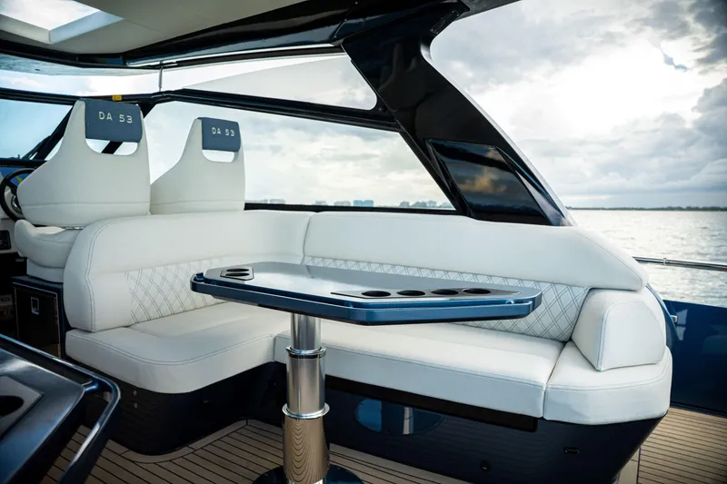 Slide: The Image of Luxurious interior of 2025 Dutch American DA 53 yacht with elegant seating and table. - 37