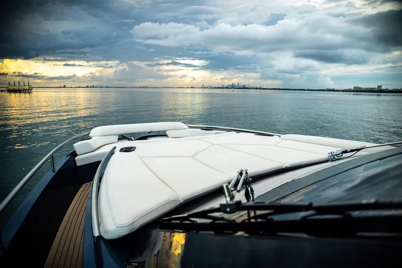 Slide: The Image of Luxurious Dutch American DA 53 yacht on serene waters at sunset, 2025 model. - 43