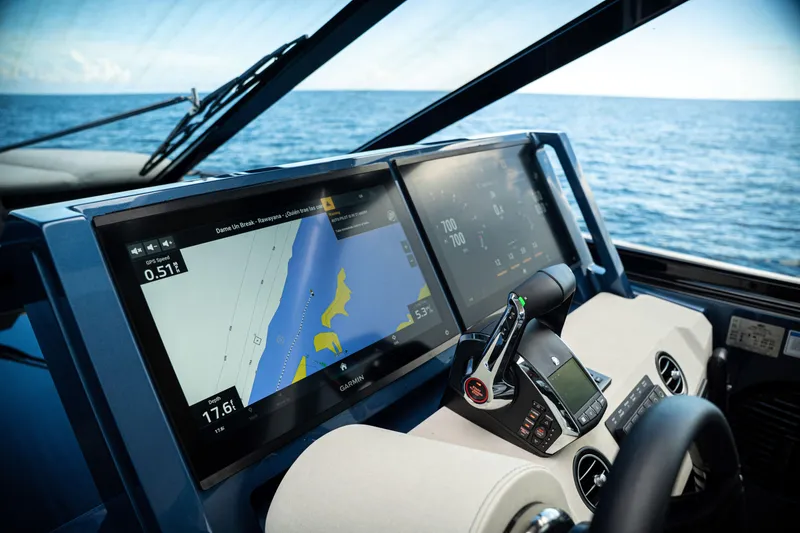 Slide: The Image of Cockpit of 2025 Dutch American DA 53 yacht with advanced navigation displays. - 52