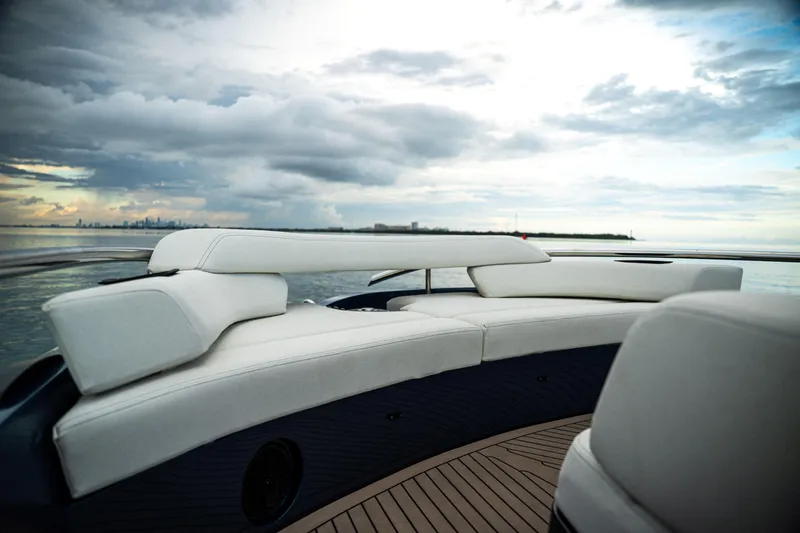Slide: The Image of Luxurious Dutch American DA 53 yacht interior with white seating, ocean view, 2025 model. - 54