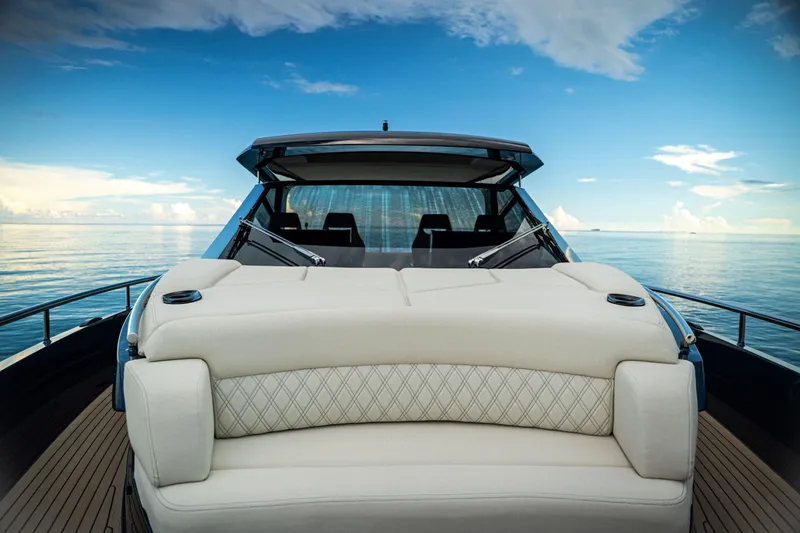 Slide: The Image of Luxurious 2025 Dutch American DA 53 yacht on serene ocean waters. - 65