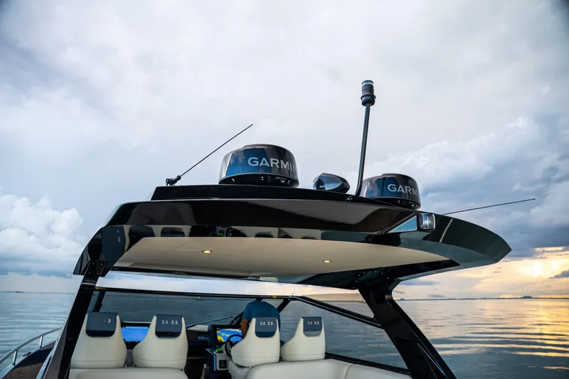 Slide: The Image of Luxury Dutch American DA 53 yacht with advanced Garmin navigation, 2025 model, on calm waters. - 66