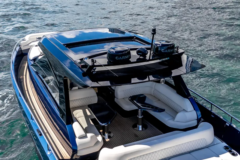 Slide: The Image of Luxurious 2025 Dutch American DA 53 yacht with sleek design and modern seating on the water. - 7